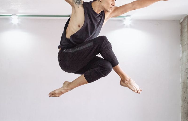 A person in mid-motion, showing fluid movement.